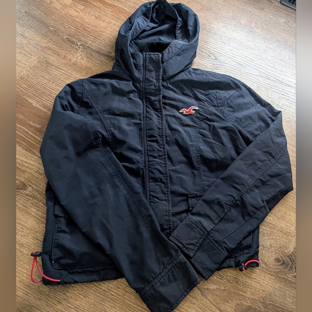 Hollister girls navy windbreaker rain coat size medium. See all pics.